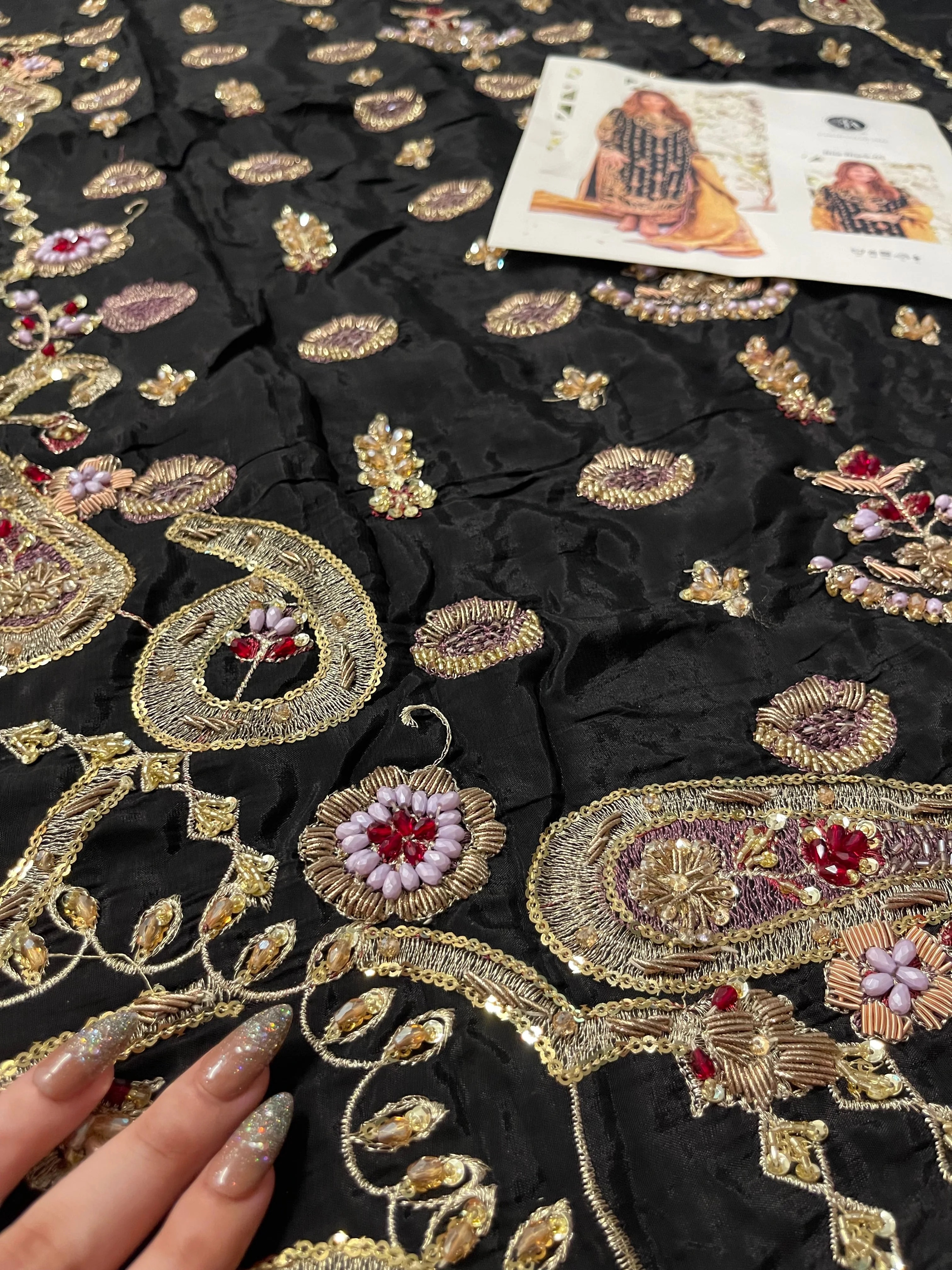 Bita Black ensemble pakistani fashion outfit in black tones.